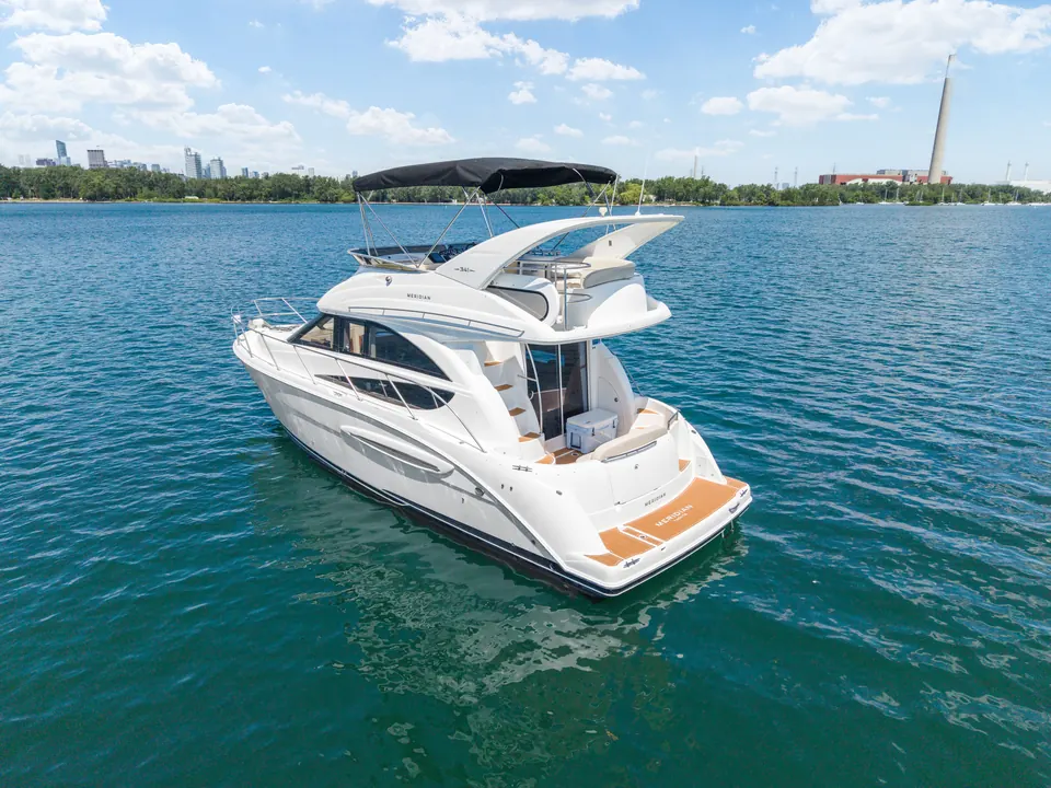 The 36&prime; Double Decker Yacht against the Toronto skyline.